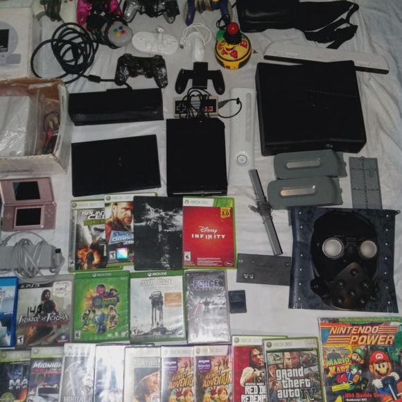 Sony Black Video Game Consoles with Controllers and Accessories